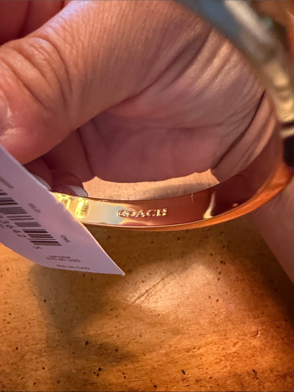 Coach Gold-Tone Crystal 'C' Hinge Bangle Bracelet - Picture 2 of 6